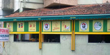 Vertical shading awnings with customized graphics for restaurant